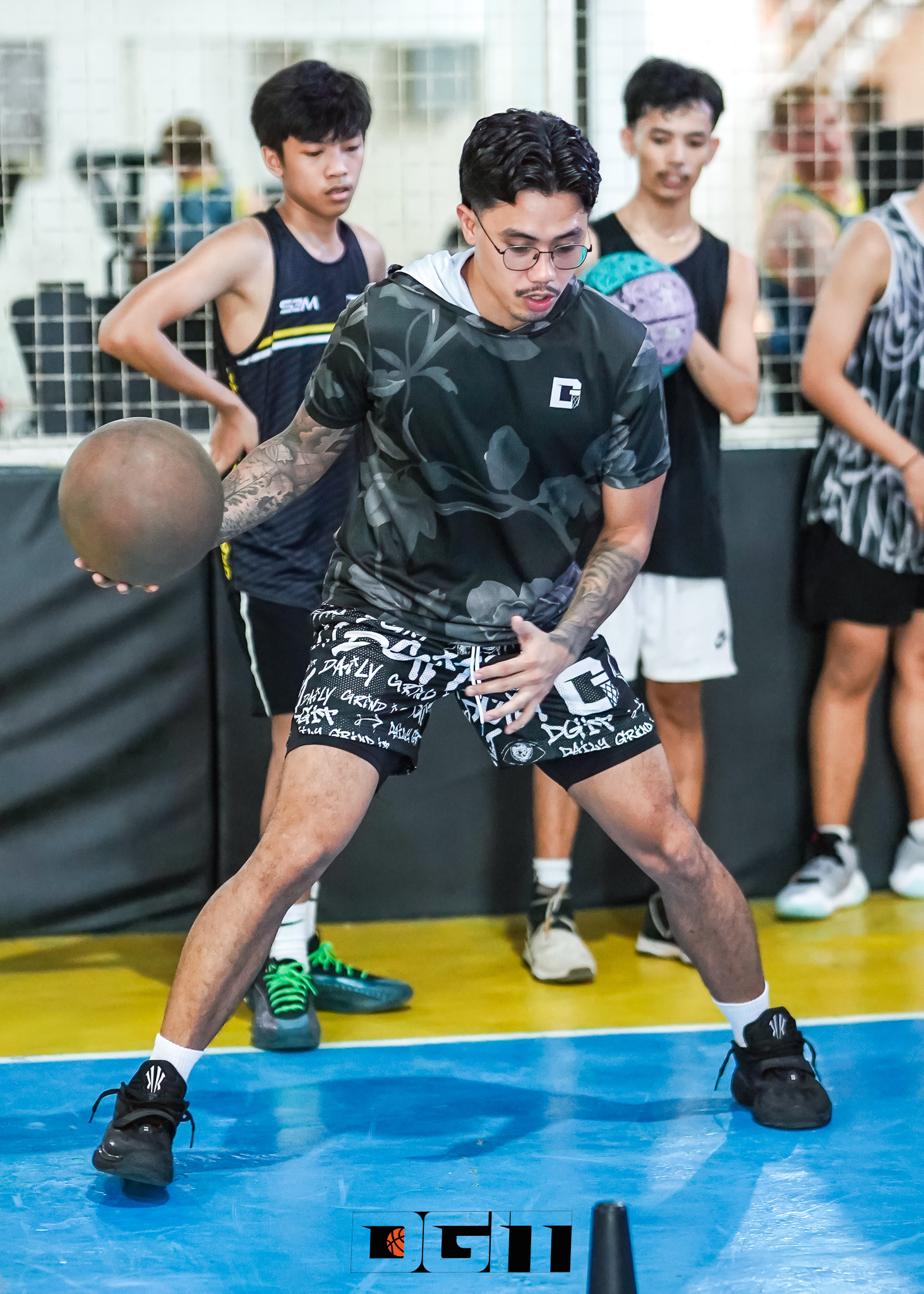 Players working through DGIT basketball drills
